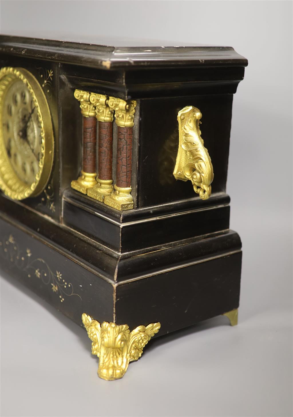 An American ebonised mantel clock, length 46cm